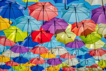 Fototapeta na wymiar Street decorated with bright colorful umbrellas on the sky, Odessa, Ukraine