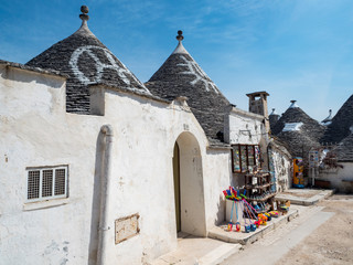 Alberobello, Puglia, Italy: Typical houses built with dry stone walls and conical roofs of the...