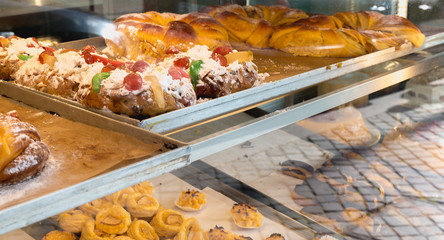 succulent Portuguese pastries displayed in Porto, Portugal