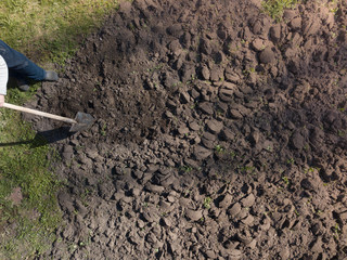 worker gardening with shovel