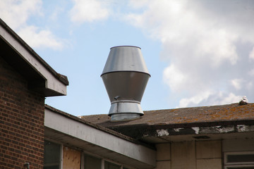 Fototapeta na wymiar chimney on the roof