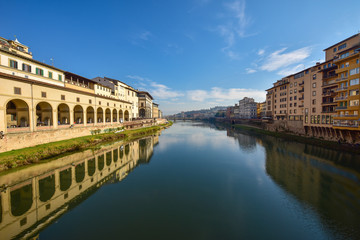 Obraz premium Arno River in Florence. View from the Ponte Vecchio. Tuscany. Italy. 