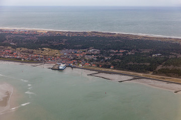Aerial view Dutch island Vlieland with pier and ferry terminal