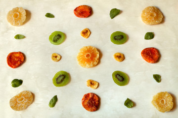 Flat lay mixed dried fruit pattern isolated on the beeswax wraps paper.