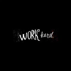 Fototapeta na wymiar Work hard- inspiring,motivation quote on a grunge black background .