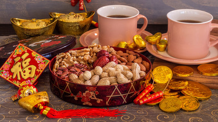 Chinese New Year snack box, traditionally served to guests. Chinese symbol on diamond shape means 