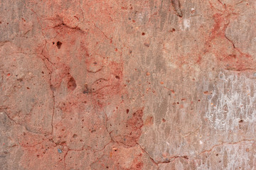 Texture, wall, concrete, it can be used as a background. Wall fragment with scratches and cracks