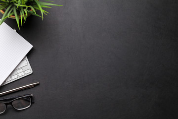 Office table with supplies and computer