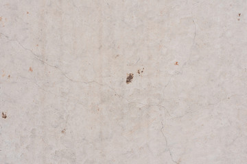 Texture, wall, concrete, it can be used as a background. Wall fragment with scratches and cracks