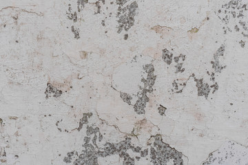 Texture, wall, concrete, it can be used as a background. Wall fragment with scratches and cracks