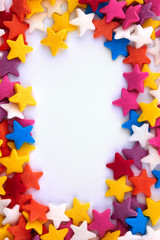 Colorful bright background, multi-colored stars. Sweet nice background candy.