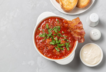 Tomato soup with bacon. The view from the top. Copy-space.