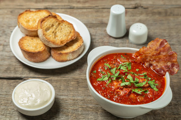 Tomato soup with bacon. European cuisine.