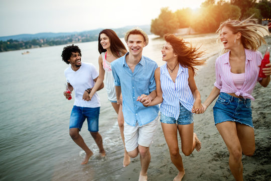 Happy people having fun in summer holidays. Friends, vacation, summer lifestyle and youth concept