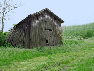 Fototapeta premium rural shed or barn that is falling down
