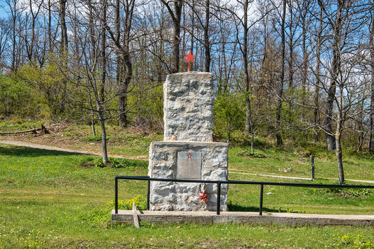 Krupanj, Serbia April 20, 2019: Red Star On Memorial. A grave of soldiers from World War II in Serbia.