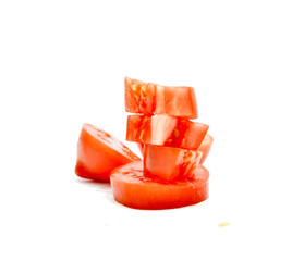 Fresh tomatoes slices on white background image