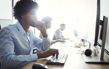 Programmer working in a software developing company office