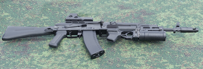modern assault rifle with underbarrel grenade launcher