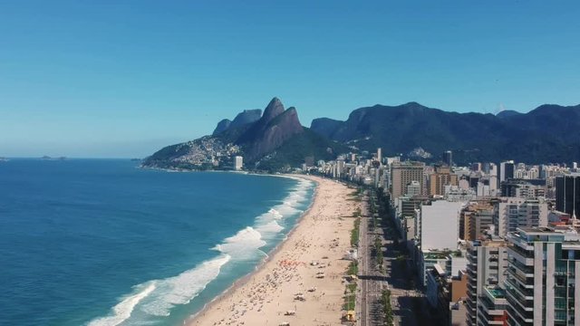 Flying above Ipanema Beach and Arpoador stone in Rio de Janeiro, Brazil