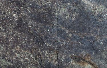 Dark background. The texture of the stone. Natural background