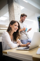 Creative business people working on business project in office