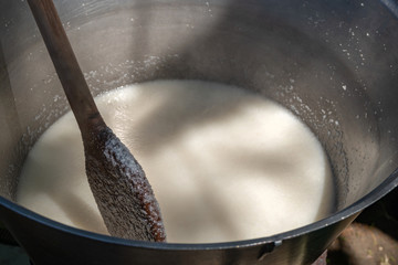 Ghomi, popular dish from Samegrelo region made of white coarse cornmeal, in big kettle. Georgian food.