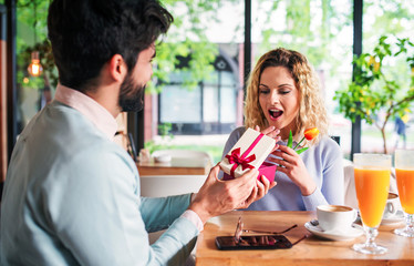 Romantic couple in the cafe. Dating, love, relationships