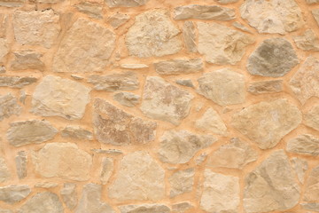 Big yellow wall from stone bricks