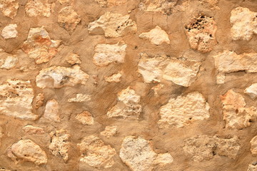 Big yellow wall from stone bricks