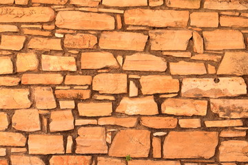 Big yellow wall from stone bricks