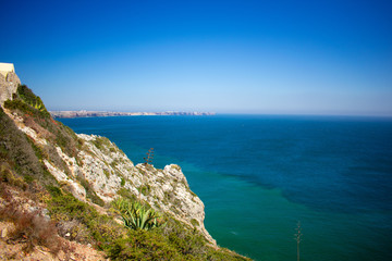 Fototapeta na wymiar Cliffs on West Coast of Atlantic Ocean in Algarve Sagres Portugal