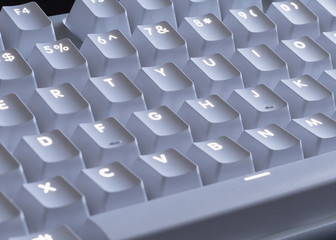 white LED glowing mechanical keyboard - close up