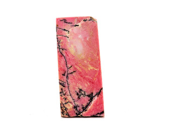 Macro stone Rhodonite mineral on white background