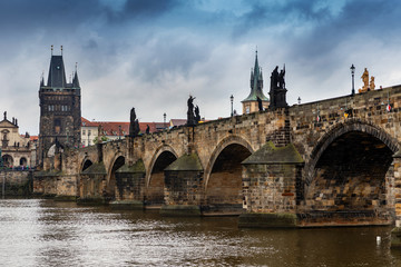Fototapeta na wymiar charles bridge in prague czech republic with dramatic sky