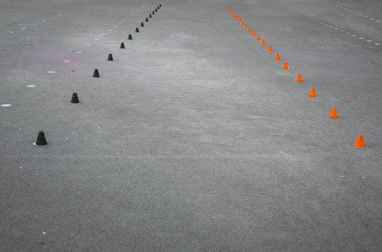 black and orange cones for rollerblading in the park