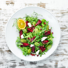 Salad. Arugula, blue cheese and beet salad. Top view.