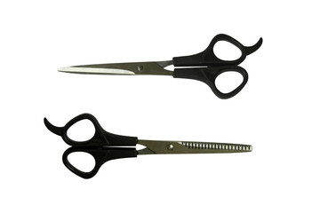 Black professional scissors for cutting regular and thinning. Isolated objects on white background. The working tools of a hairdresser.