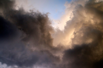 Dark dramatic swirling storm clouds in sky in bonita springs florida at sunset.