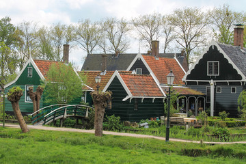 Fototapeta premium Typical holland houses and a little bridge in Zaanse Schans - Amsterdam