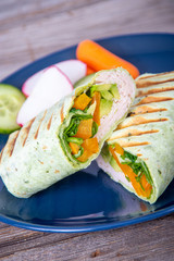 smoked turkey meat  in a pesto wrap tortilla sandwiches