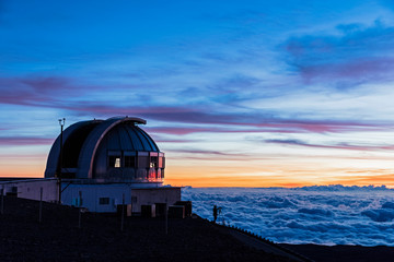 Fototapeta na wymiar USA, Hawaii, Mauna Kea volcano, telescopes at Mauna Kea Observatories at sunset