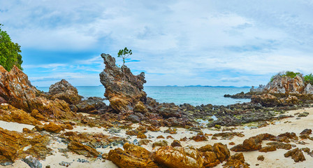 Panorama of the rocky shore, Khai Nok island, Phuket, Thailand