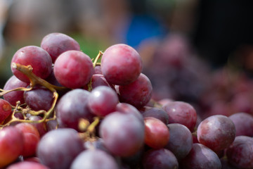 Closeup of fresh grapes on blurry background