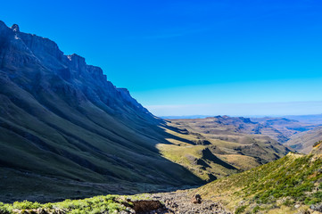 Greenery in Sani pass under blue sky near kingdom of Lesotho South Africa border near KZN and Midlands meander