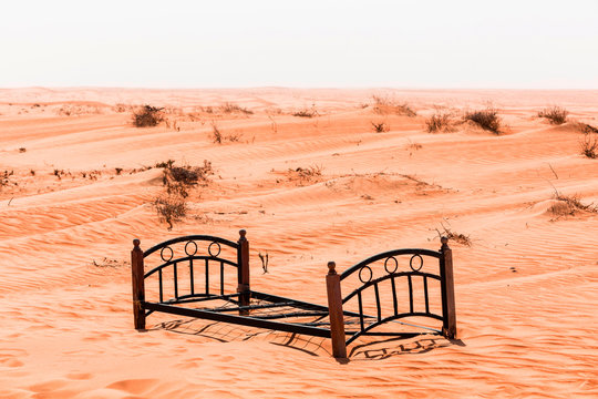 Abandoned bed frame in the sand, Wahiba Sands, Oman