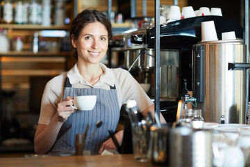 Woman with cup of coffee