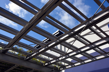 Glass Roof Construction under Blue Sky