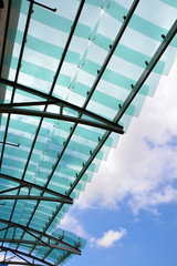 Green Glass Roof and Cloudy Sky
