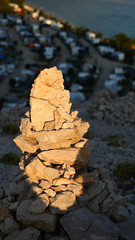 Small pile of stones in the mountains during the sunset, close view
